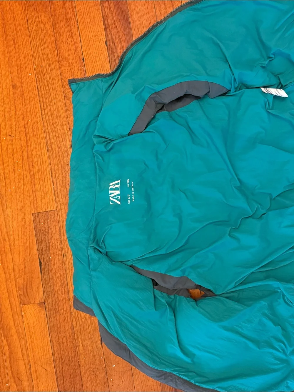 Zara Women’s Dark Green Puffer Vest with Teal Lining